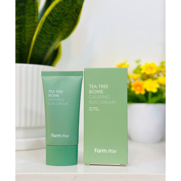 Farmstay Tea Tree Biome Calming Sun Cream – krem dielli qetësues me tea tree për mbrojtje dhe balancim të lëkurës nga Bassko.